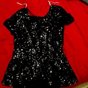 Black sequin peplum top